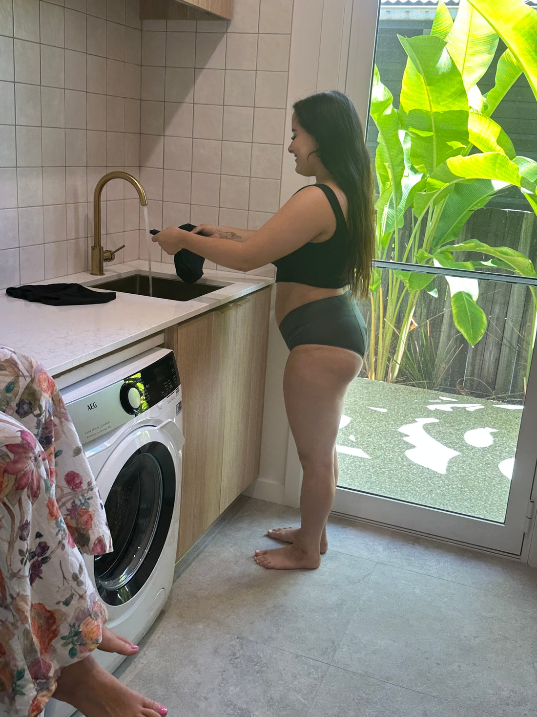 Girl washing period underwear